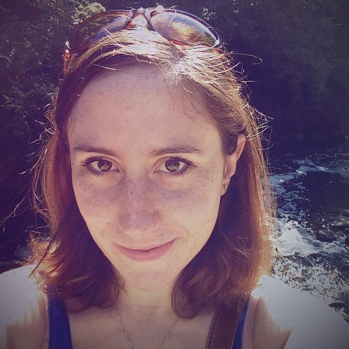 Manda Rose smiling outdoors